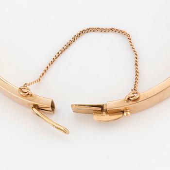 ARMRING med cabochonslipade turkoser.