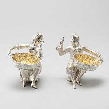 A pair of silver figurines bought at Garrard, London, 21th century.
