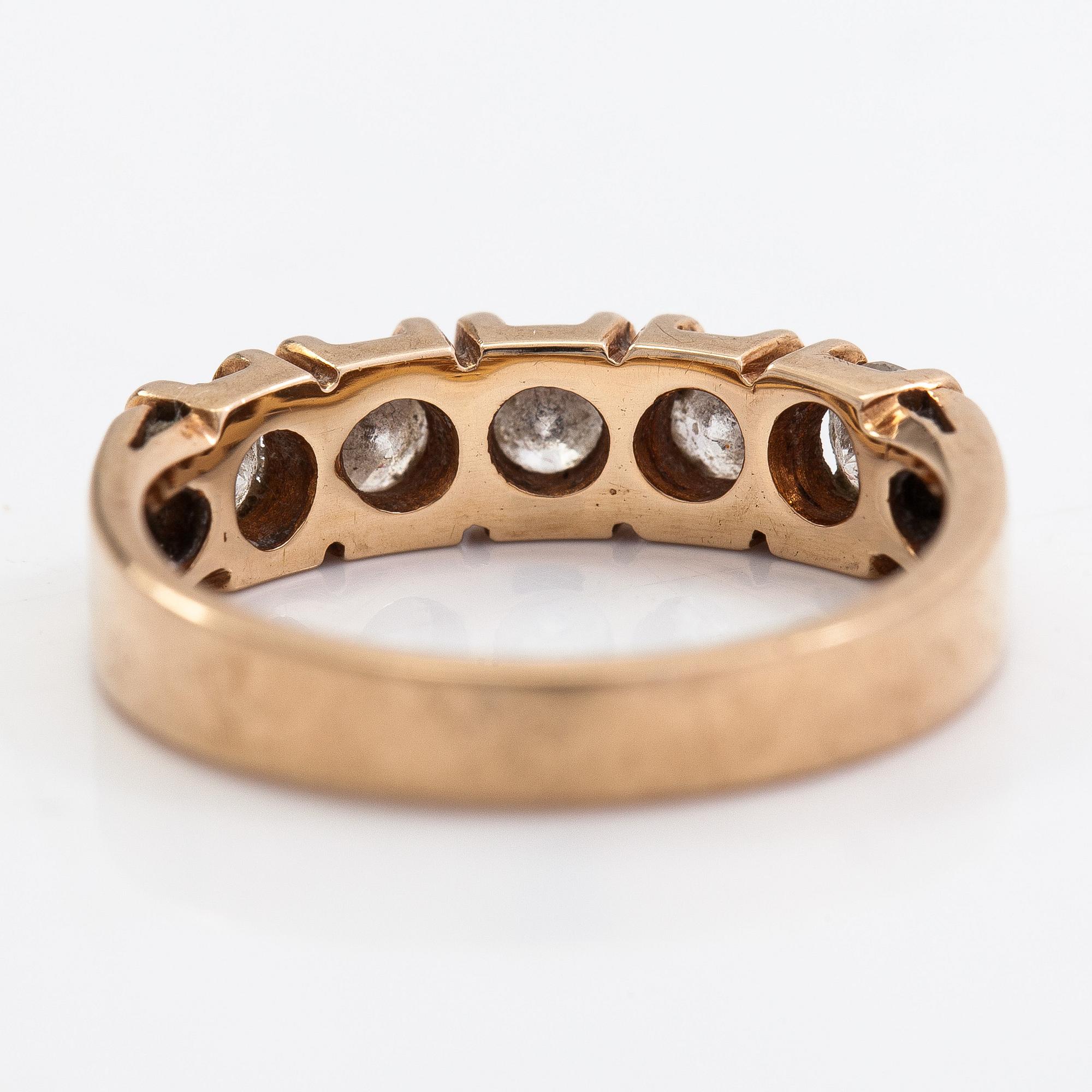 A 14K gold ring set with brilliant-cut diamonds approx. 0.75 ct in total, 2009.