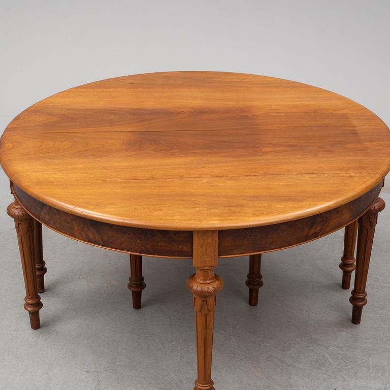 A DINING TABLE, second half of the 19th century. 5 painted leaves included.
