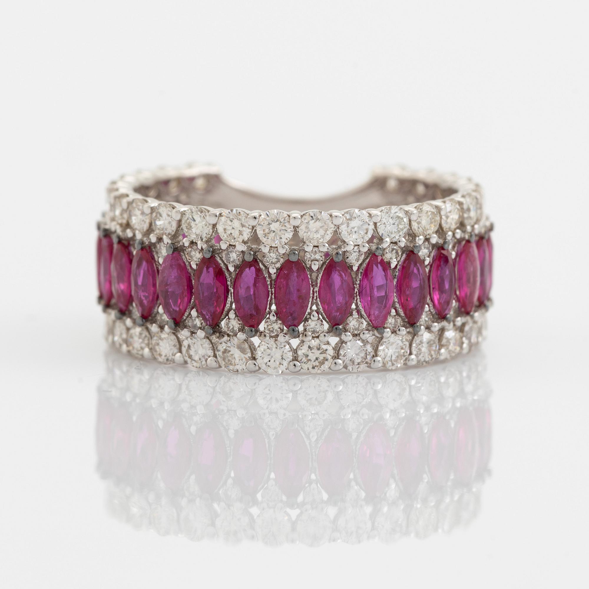 Navette ruby and brilliant cut diamond ring.