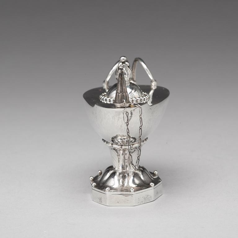 Georg Jensen, a cigar lighter in the shape of an oil lamp, Copenhagen 1918, design no 12, 830/1000.