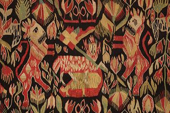 A carriage cushion, tapestry weave, "Lammet och fanan", ca 45-47 x 97,5-98 cm, Torna or Bara district,