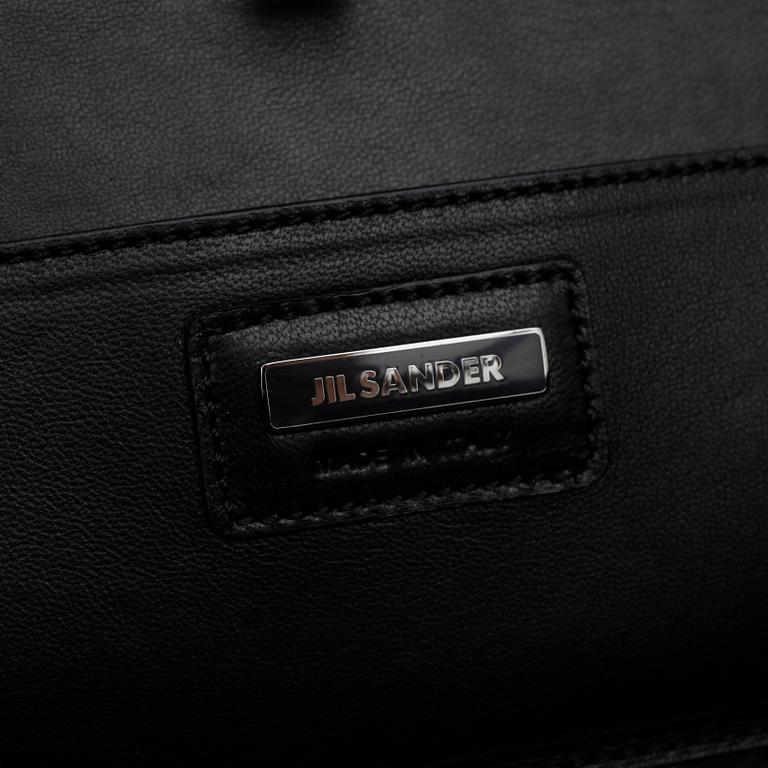 JIL SANDER, an black evening bag/clutch.