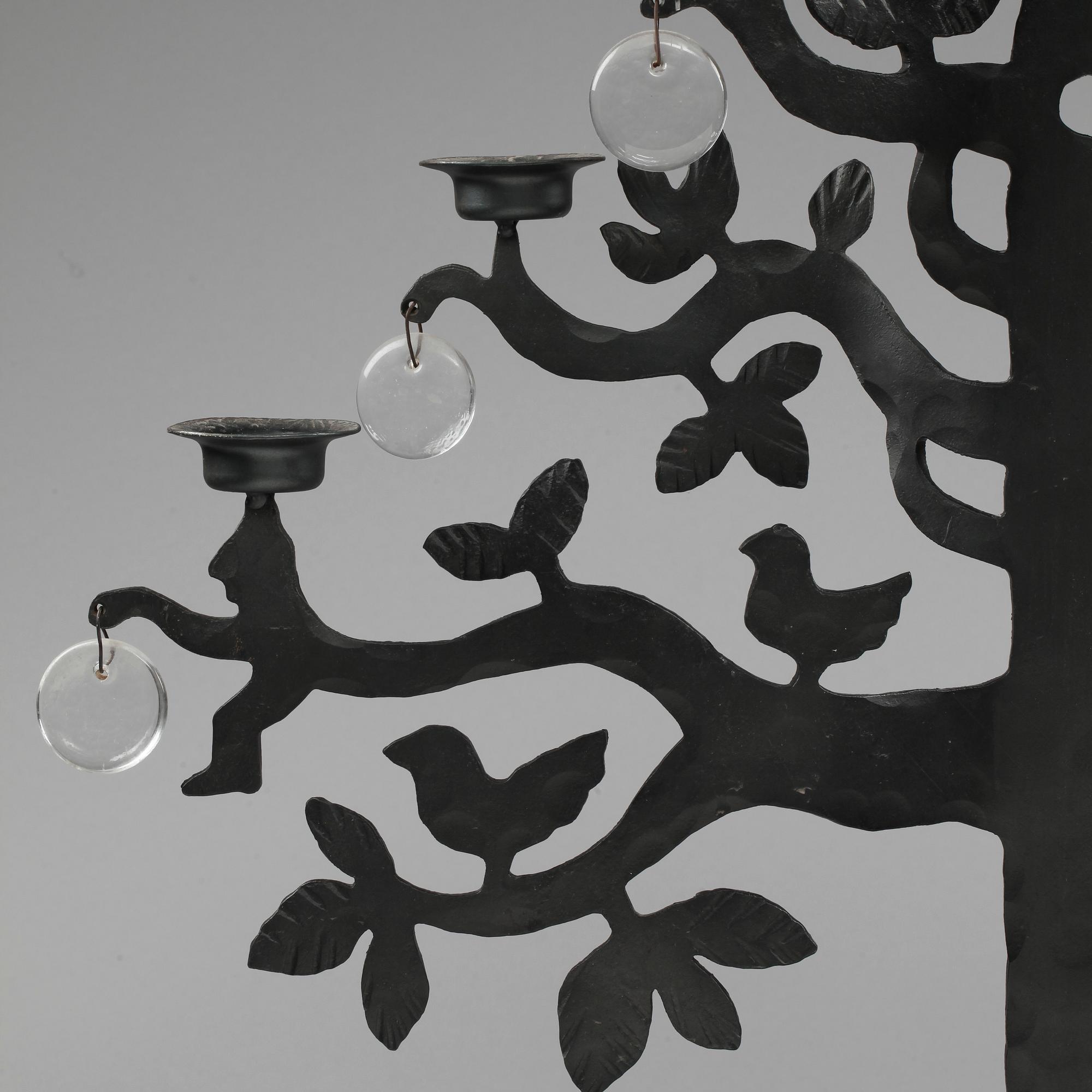 LJUSSTAKE, järn, design Bertil Vallien. 1900-talets andra hälft.