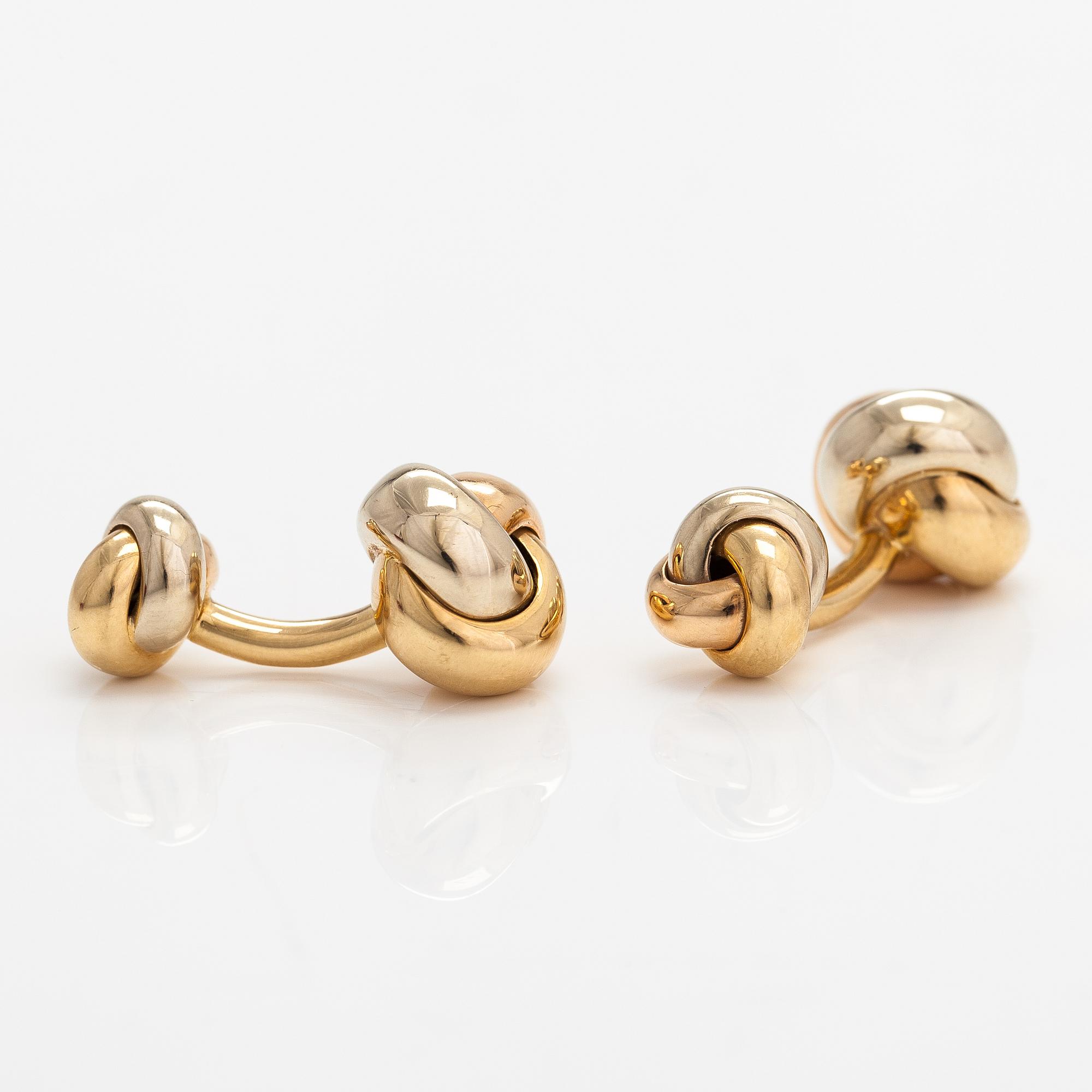 Cartier, A pair of 18K gold "Trinity" cufflinks. Marked Cartier M03073.