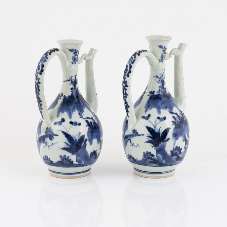 A pair of Japenese blue and white ewers, probably Meiji (1868-1912).