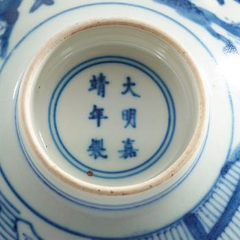 A blue and white bowl, late Qing dynasty with Jiajings six character mark.