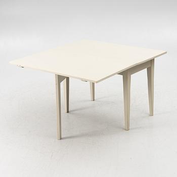 A drop-leaf table, late 19th century.