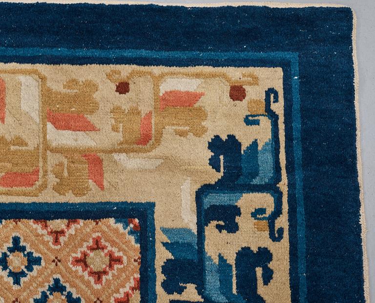 A CARPET, an antique/semi-antique Ningxia probably, China, ca 492,5-494,5 x 388-389,5 cm.