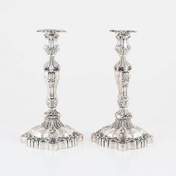 Gustaf Möllenborg, a pair of neo-Rococo silver candlesticks, Stockholm, 1844.