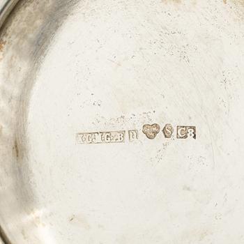 Two silver beakers and a bowl,