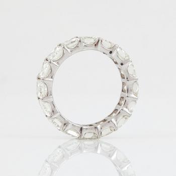 A radiant-cut diamond, circa 7.00 cts in total, eternity ring.