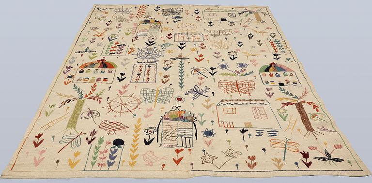 A hand-embroidered Kilim rug, approx. 243 x 178 cm.