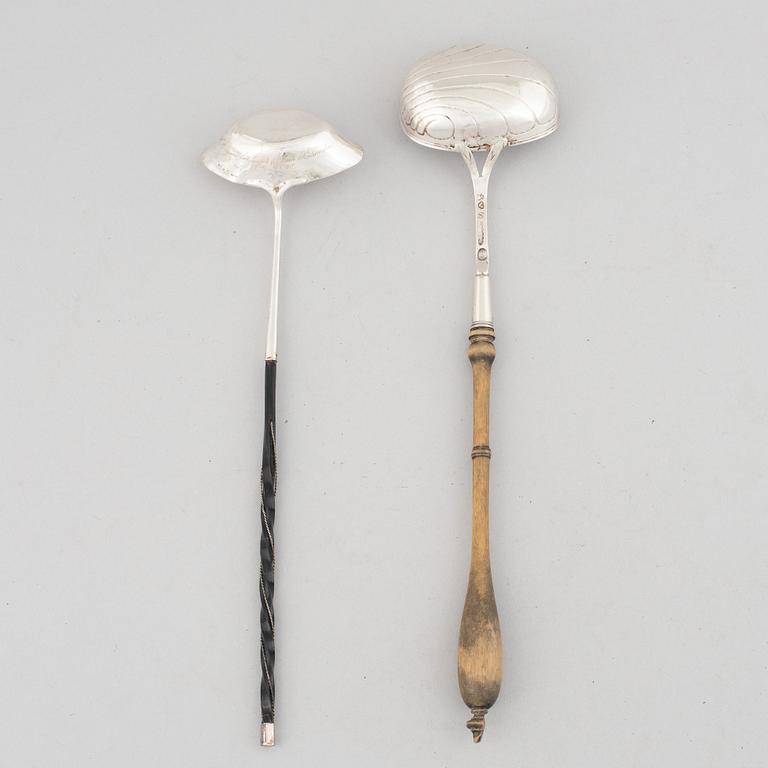 Two Swedish silver soup ladles, late 18th-early 19th Century.