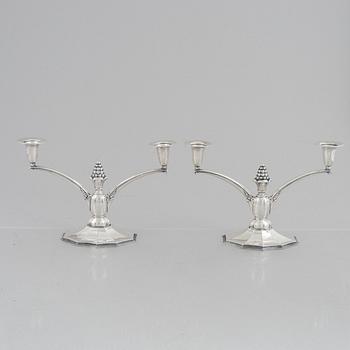 A pair of silver candelabra, Swedish import marks, probably 1920's/30's.