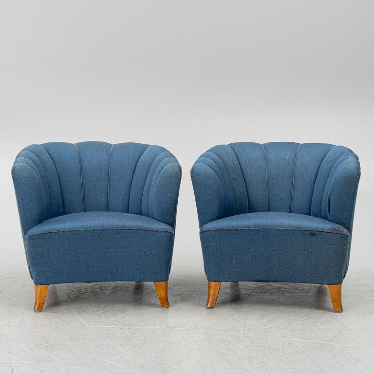 A pair of 1950's armchairs.