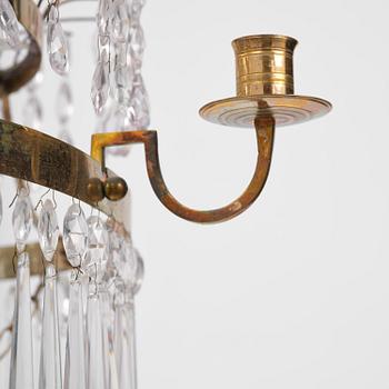A late-Gustavian five-light gilt brass and cut glass chandelier, Stockholm, late 18th century.