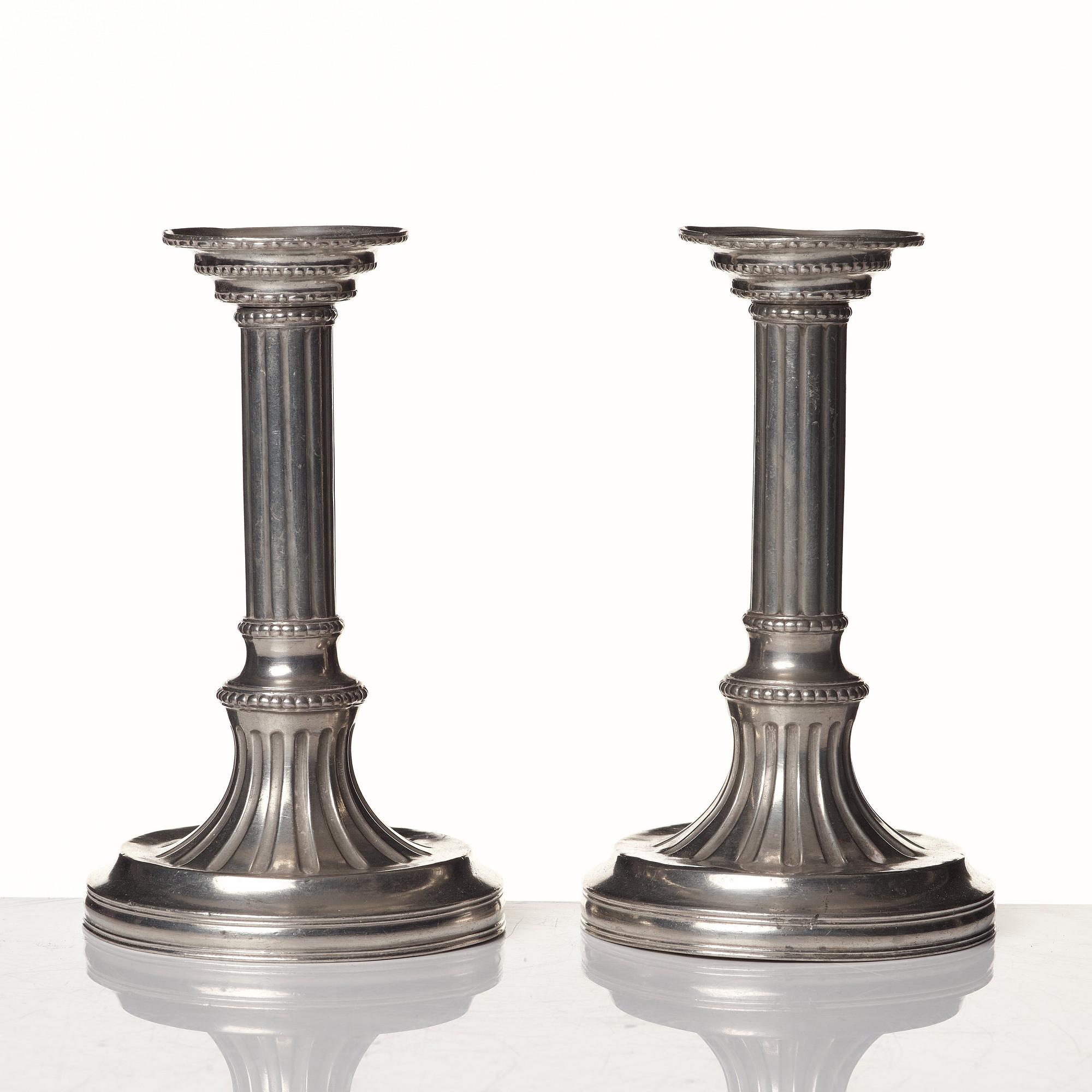 A pair of Gustavian pewter candlesticks by R Ryman 1784.