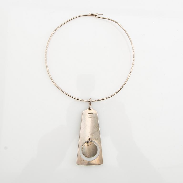 Neck ring, 18K white gold, Pernlos Gold & Silversmithing, 1976, Malmö, and pendant, sterling silver, Hans Hansen, Denmark.