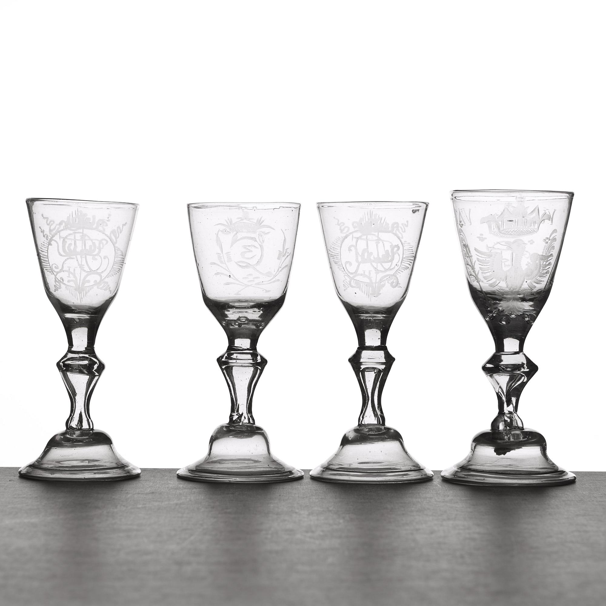 A set of four wine glasses, 18th Century.