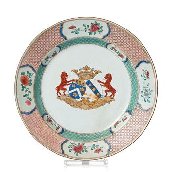 1070. A Chinese armorial famille rose dish. Qing dynasty, Qianlong (1736-95).