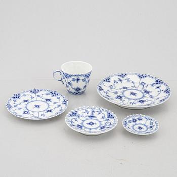 An 84-piece porcelain "blue fluted" dinner and coffee service, full and half lace, Royal Copenhagen, Denmark.