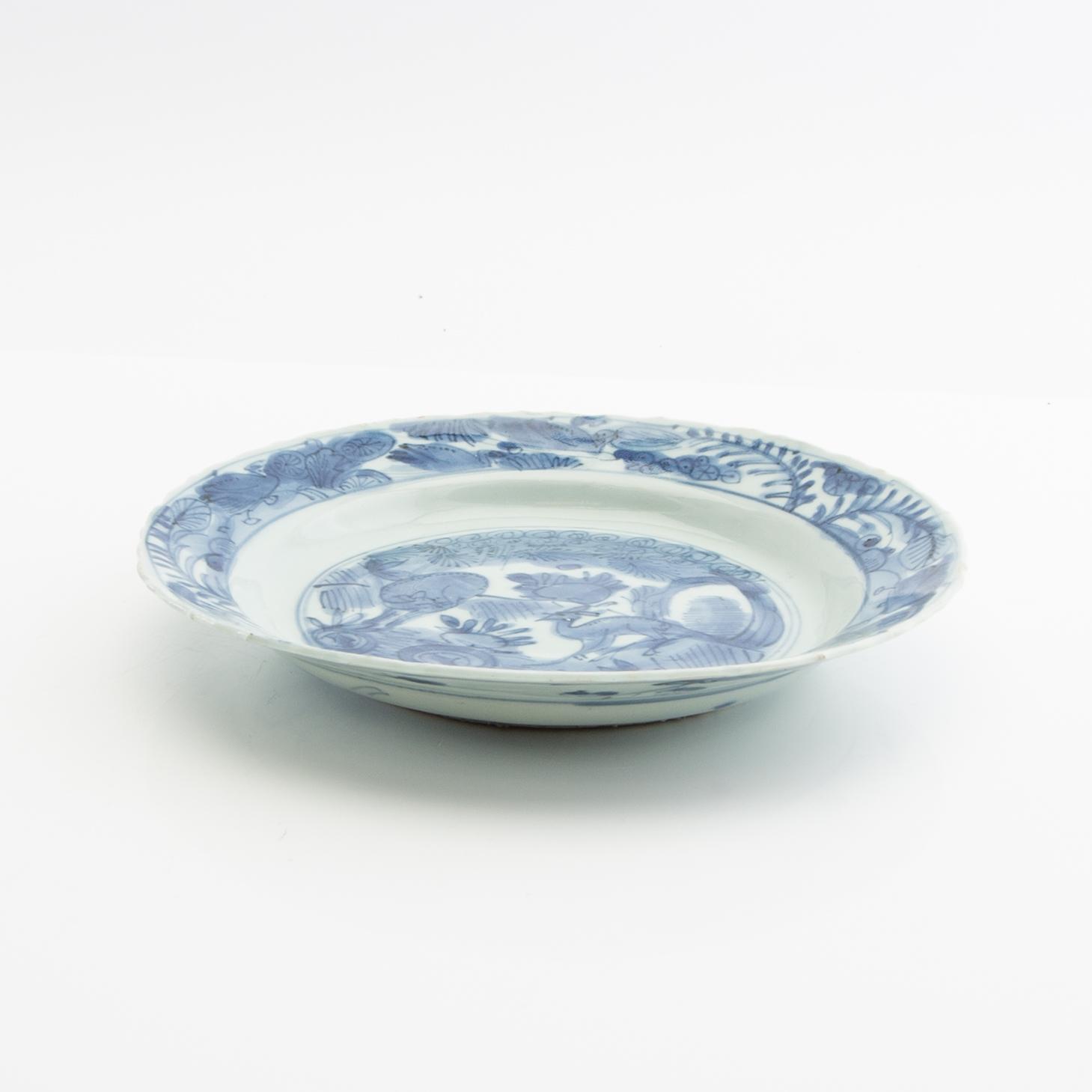 A blue and white dish and cup, Ming dynasty.