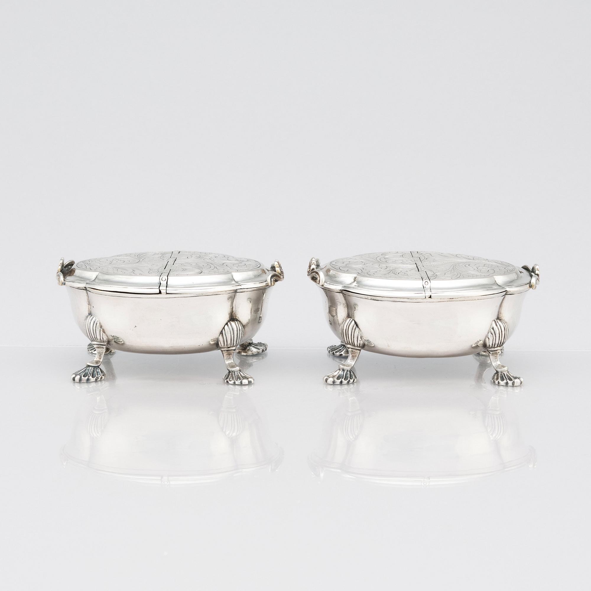 A pair of Latvian Rococo silver salt and pepper stands, marks of Johan Christian Henck (Henke), Riga 1768-80.
