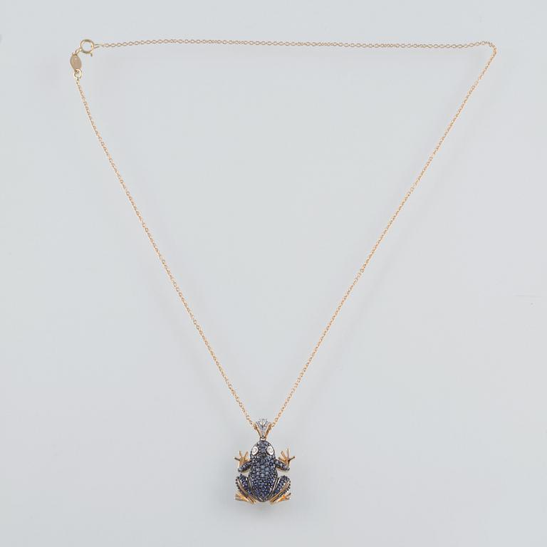 HÄNGE, 18K guld med briljantslipade diamanter och fasettslipade blå safirer ca 0.60 ct. Vikt 4,8 gram.