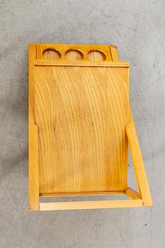An Italian oak trolley later part of the 20th century.