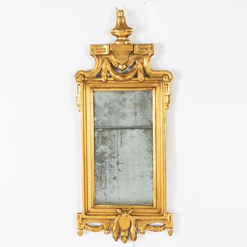 A Gustavian giltwood mirror by C. G. Fyrwald (master in Stockholm 1776-1825).