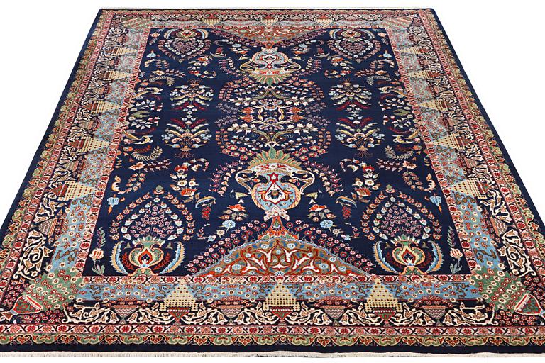 A Kashmar carpet, c. 356 x 260 cm.