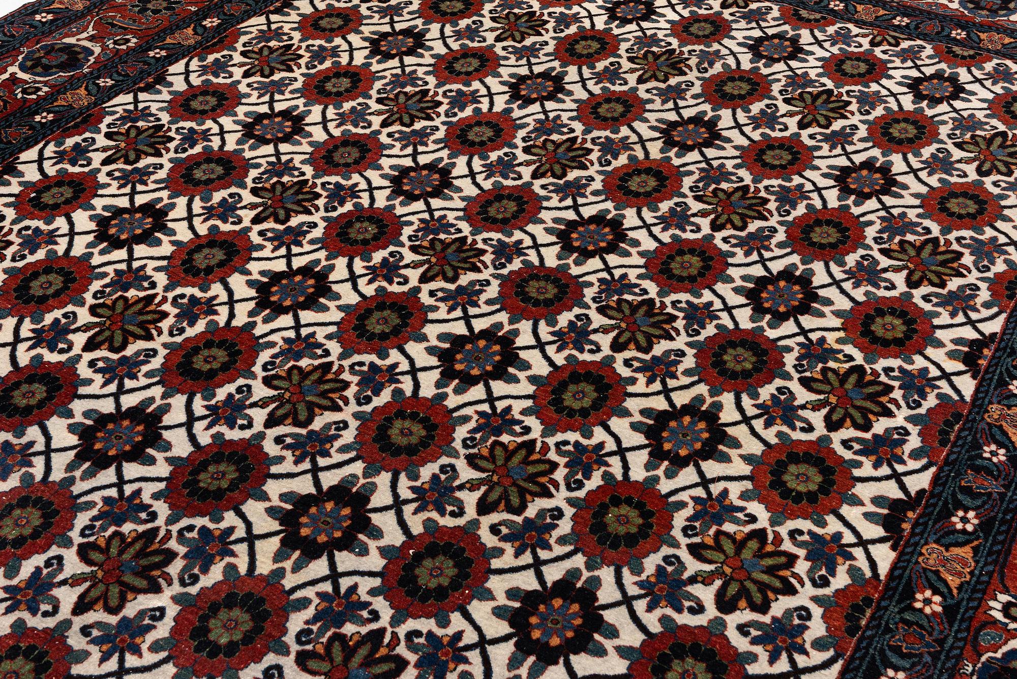 An antique Veramin carpet, West Persia, 380 x 271 cm.
