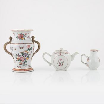 A Chinese export famille rose urn, teapot and jug, Qing dynasty, 18th century.