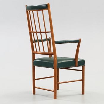 A Josef Frank mahogany and green leather armchair, Svenskt Tenn, model 652.