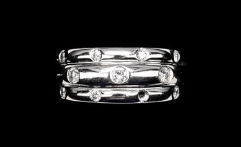 RING, 18k vitguld med briljantslipade diamanter, tot 0.31 ct enl gravyr.