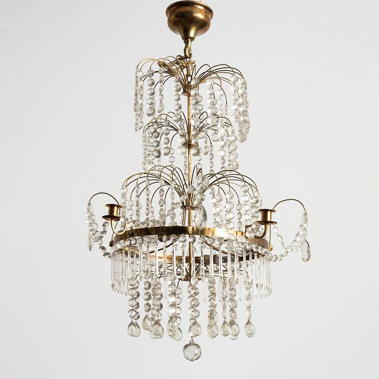 A four-light Gustavian-style chandelier, circa 1900.