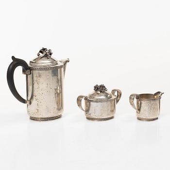 A Swedish silver coffee pot, cream jug and sugar bowl, mark of Caneman & Wallen, Stockholm 1949.