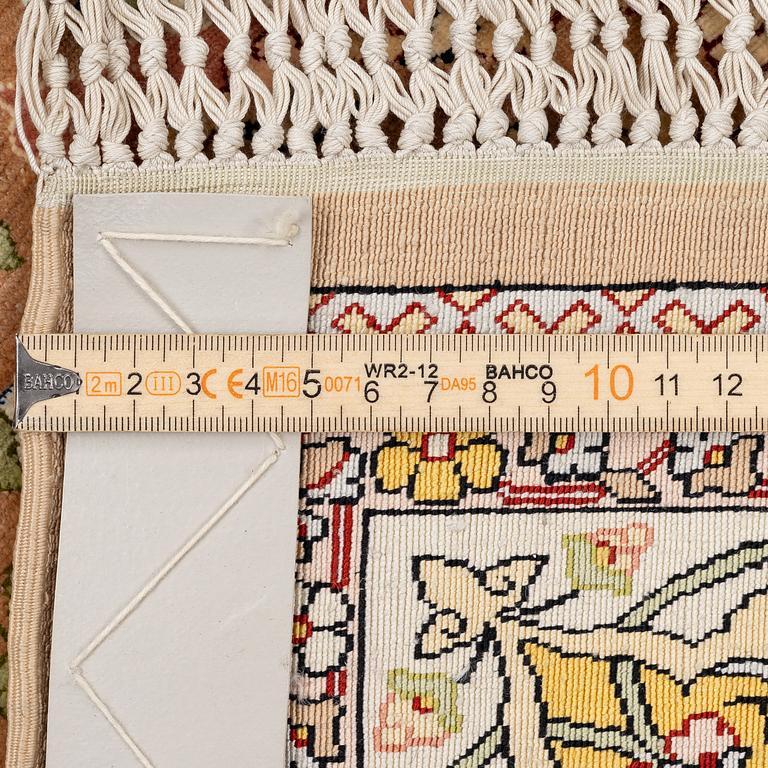 A semi-antique Hereke souf, silk and metal thread rug, West Anatolia, c. 163 x 103 cm.