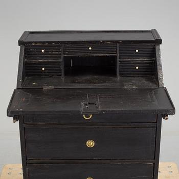 a chest of drawers from the 19th century.