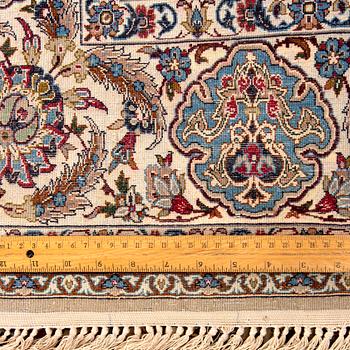 A signed isfahan part silk carpet ca 192 x 118 cm.