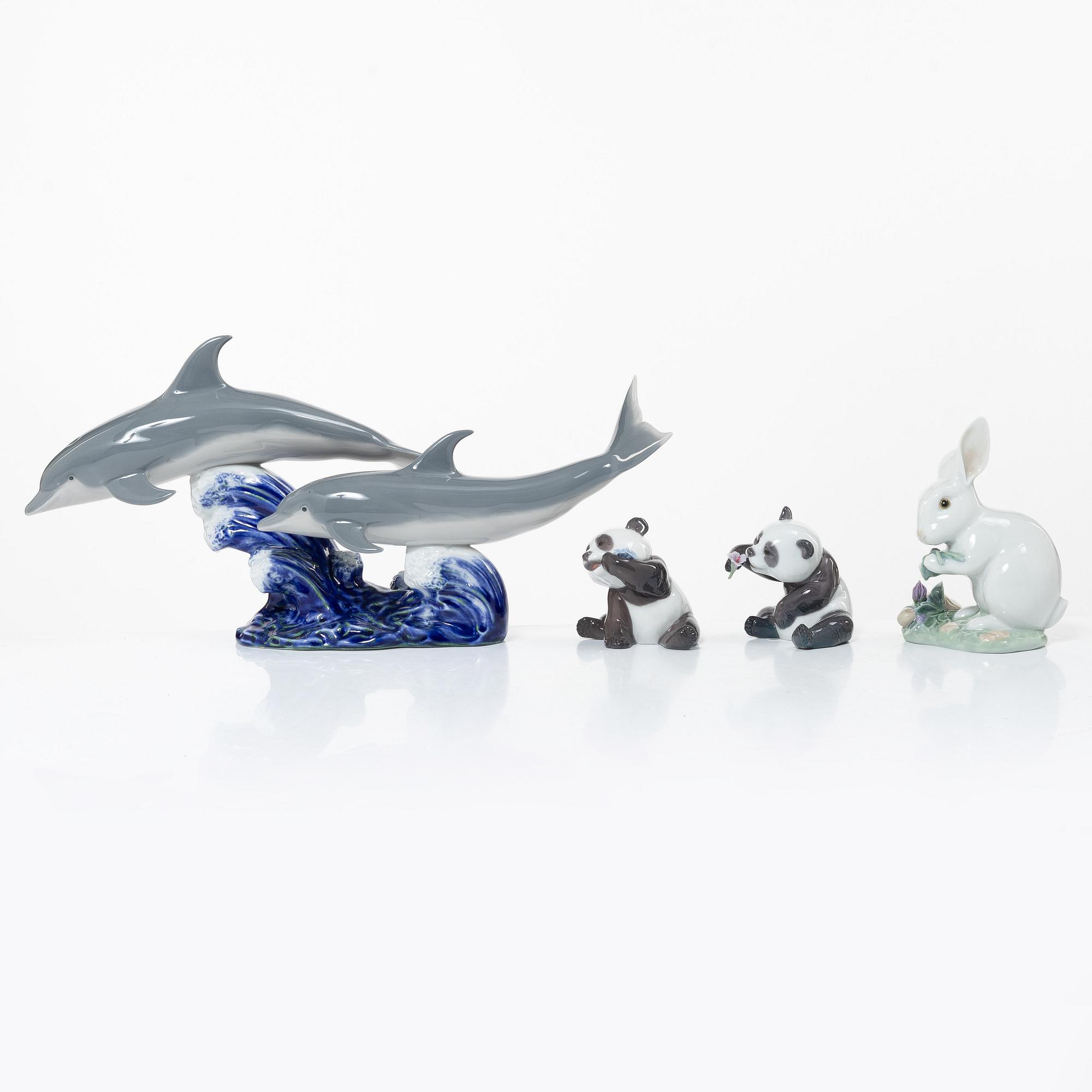 Lladró, 4 figurines, "The Chinese Zodiac": "A happy panda", "A cheerful panda", "The Rabbit", "Dance of the Dolphins".