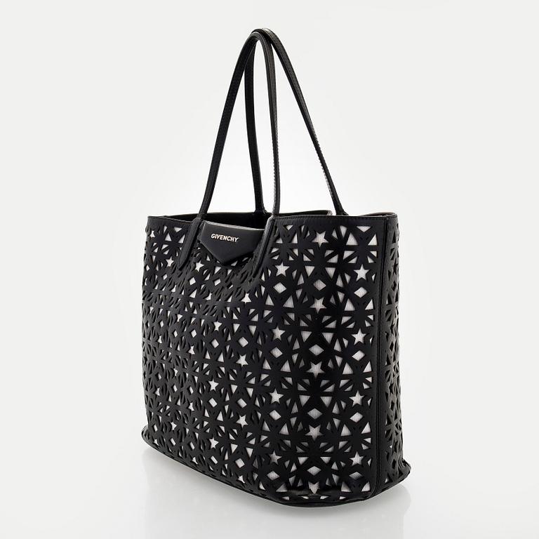 Givenchy, a 'Star Perforated Antigona Shopper' bag.