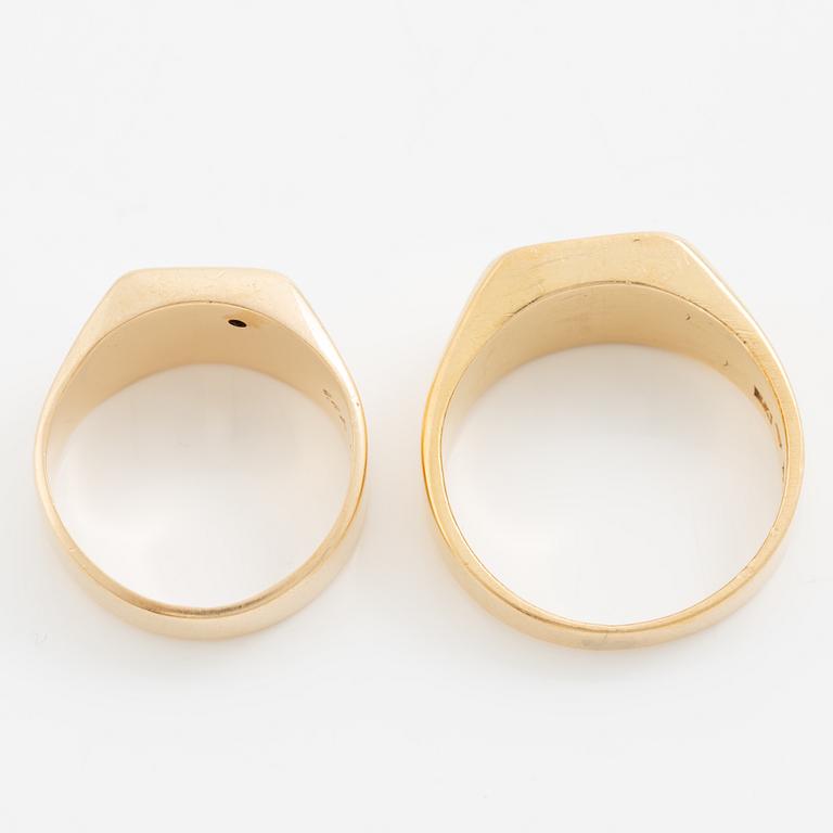 Two rings 18K gold.