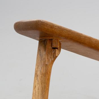 A 'CH-25' armchair designed by Hans J Wegner for Carl Hansen & Søn, Denmark.