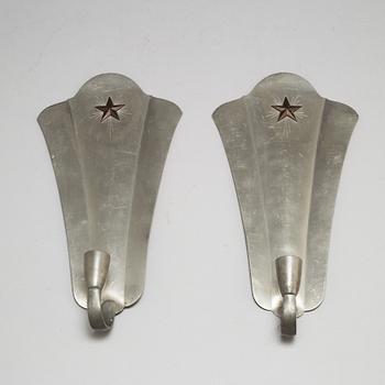 GAB, a pair of pewter wall sconces, 1932.