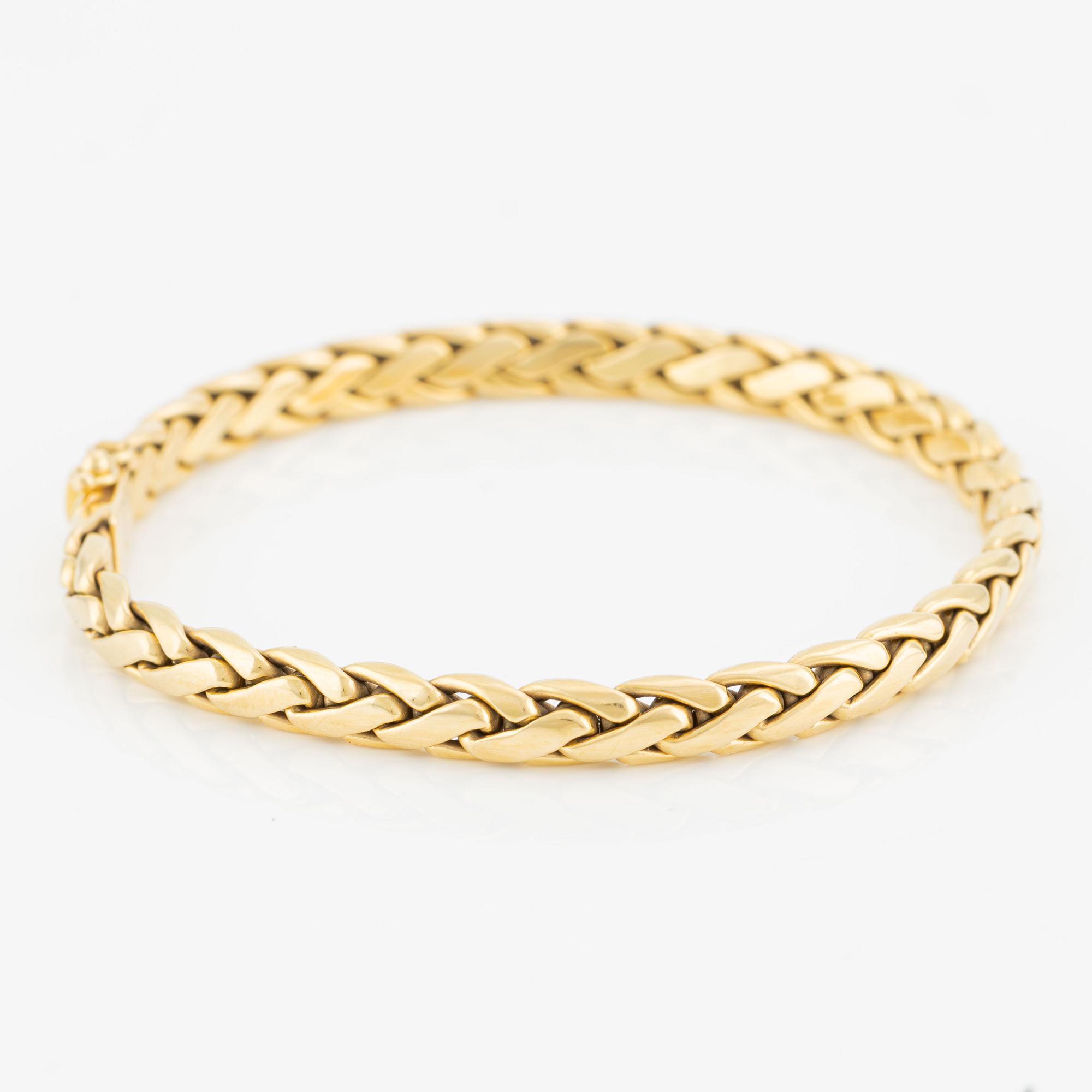 Collier/armband med en rund briljantslipad diamant ca 0.35 ct.