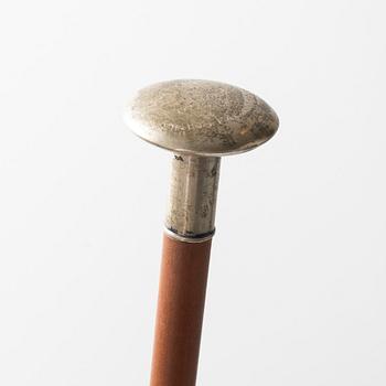 A wooden riding crop with silver mountes knob, 1929, Sweden, price from a horse jumping contest.
