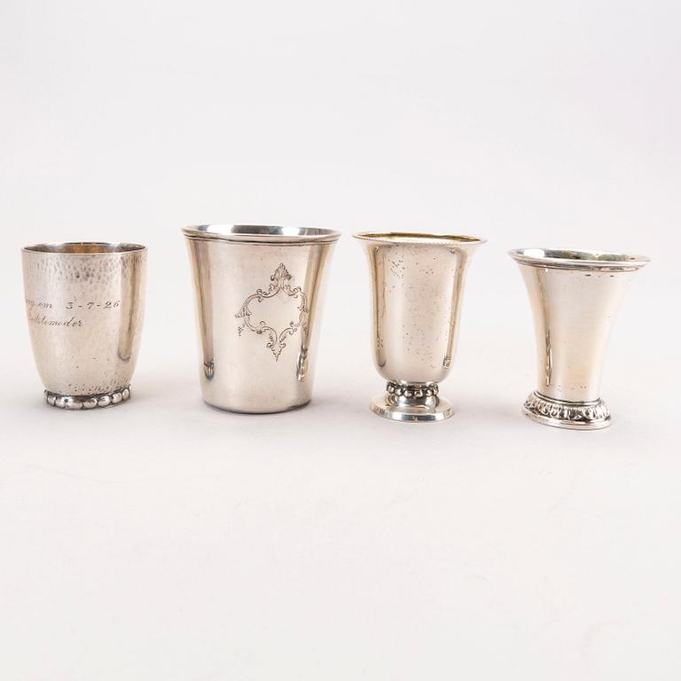 Six 20th century, miniature beakers, silver, makers of Georg Jensen, Lachmann and others.